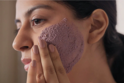 Use your fingertips to evenly distribute the pack on your skin