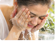 Start by wetting your face with lukewarm water.