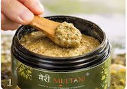 Scoop a small amount of face wash using clean fingers or a spatula